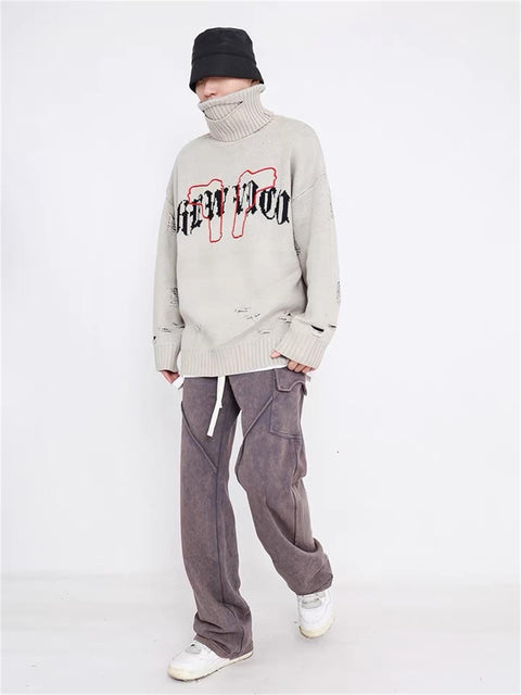 Tassel Pistol Turtleneck Sweater